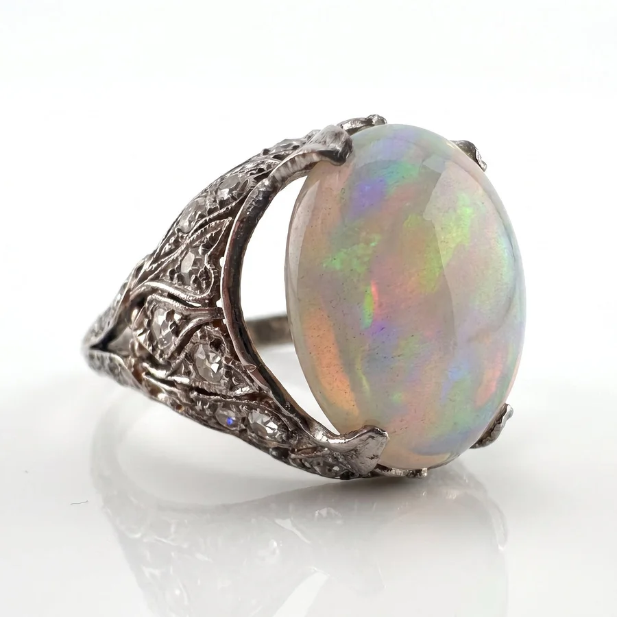 Antique platinum and opal filigree ring from Manthe Schwarz, photographed by Aurix