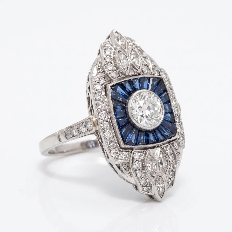 Art deco old European diamond and French cut sapphire platinum ring from Manthe Schwarz, photographed by Aurix